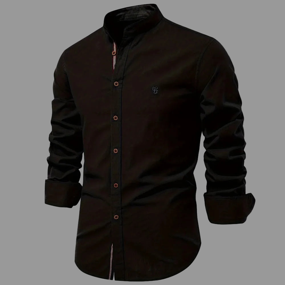Black button-up shirt on a white background