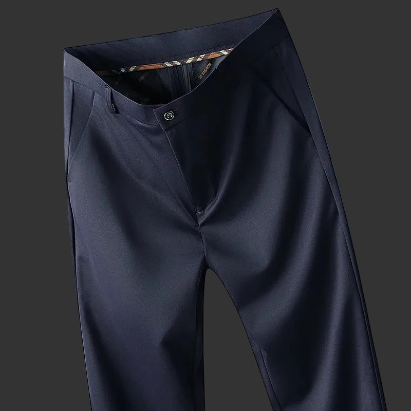 Black pants displayed against a blue gradient background