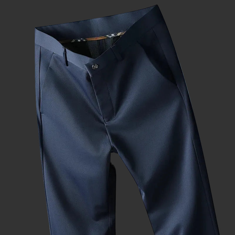 Dark gray pants on a light blue gradient background