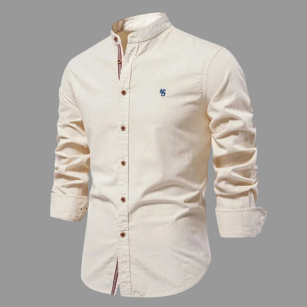 Beige long-sleeve shirt with a small logo on a white background