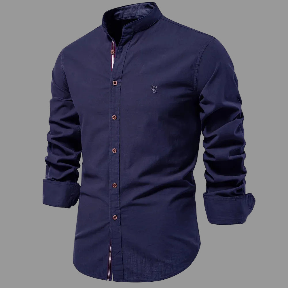 Navy blue shirt with rolled-up sleeves on a white background