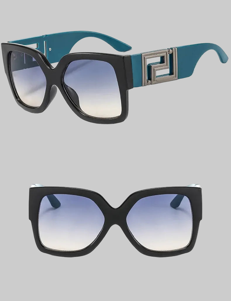 Two views of oversized square sunglasses with thick black frames, gradient blue-tinted lenses, and teal arms with a silver geometric metal detail. Chinese text appears above and below the product on a white background.