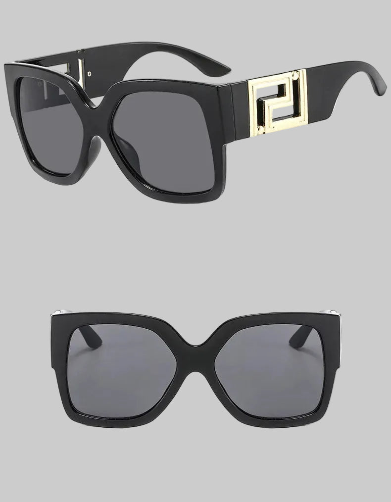 Black square sunglasses with dark gray lenses and a gold geometric accent on the temple, shown from two angles on a white background with Chinese text at the top.